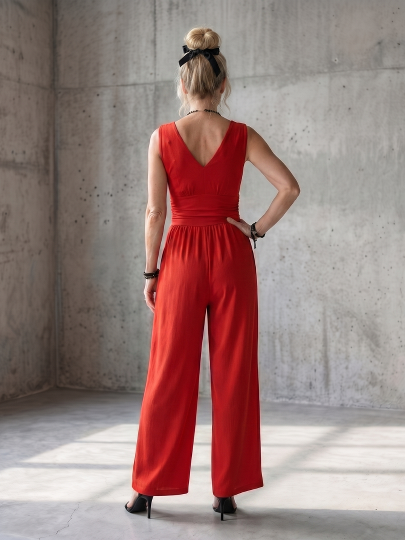 Vincenza | Defined Waist Jumpsuit with Wide Legs and Deep V Neck