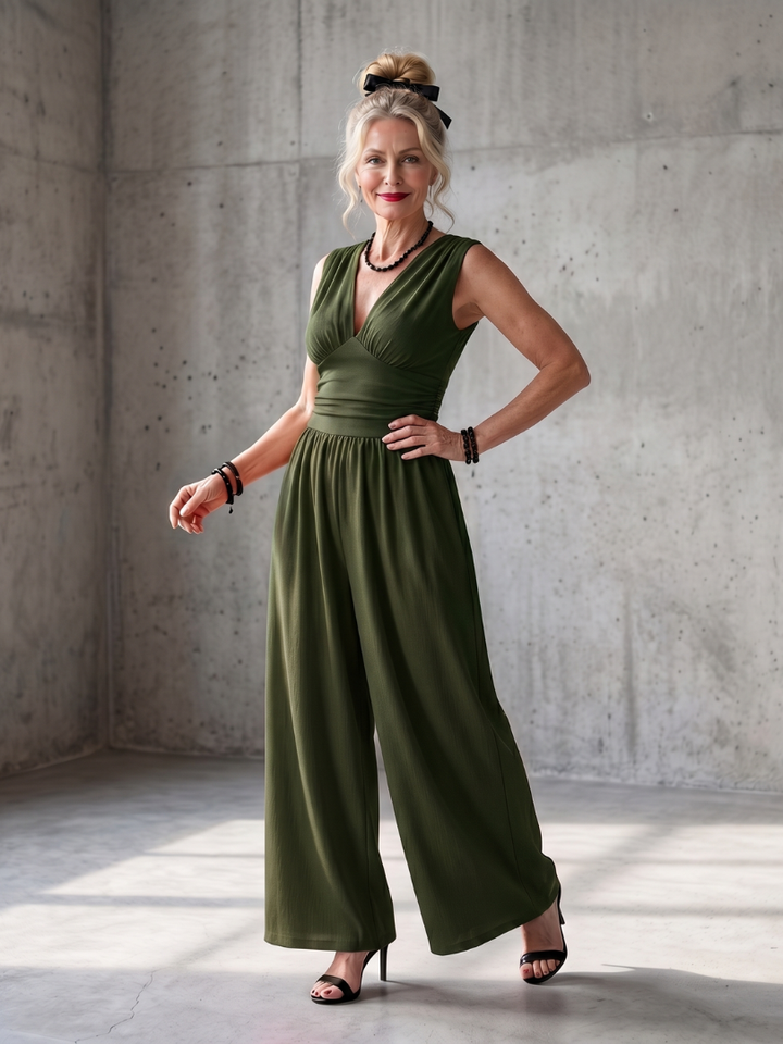 Vincenza | Defined Waist Jumpsuit with Wide Legs and Deep V Neck